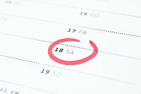 Terminkalender mit eingekreistem Termin.
