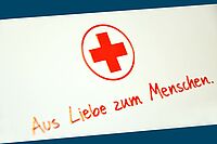Spendengutschein: Rotes Kreuz und der Text "Aus Liebe zum Menschen"
